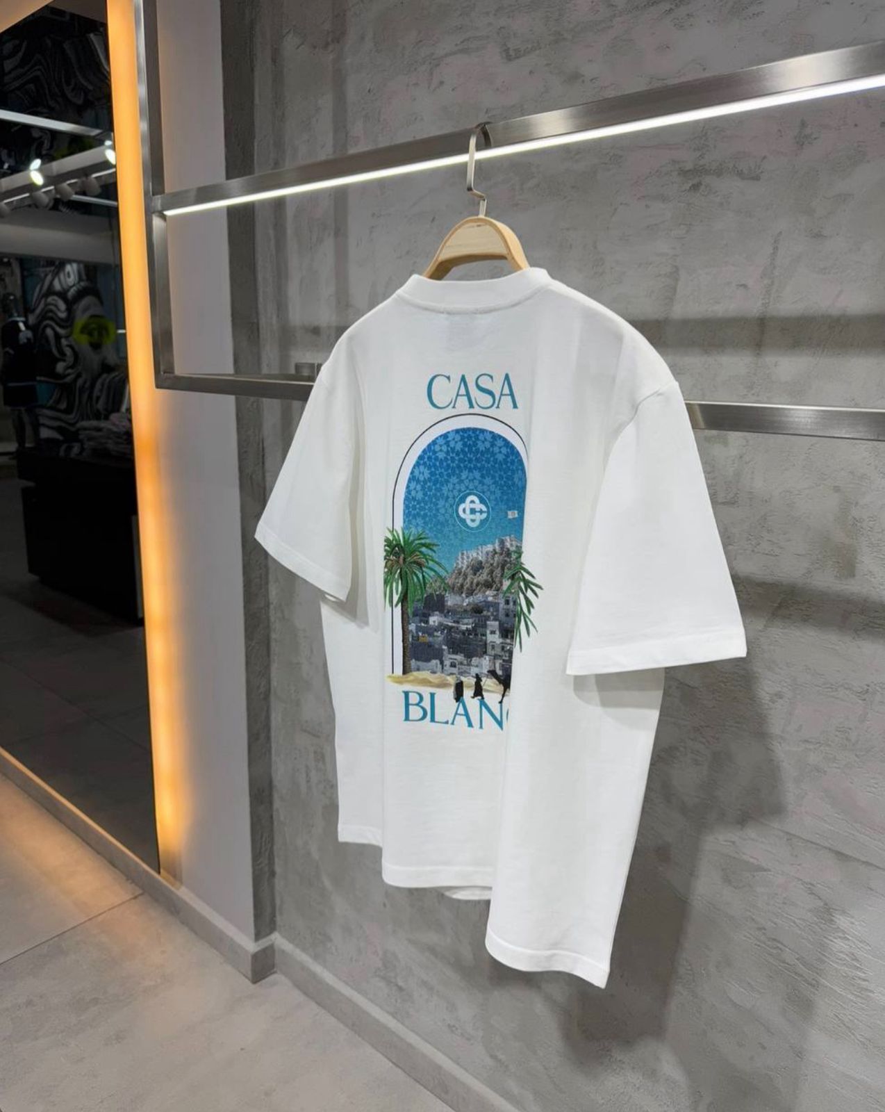 CAMISETA BLANCA ESTAMPADO DE PLAYA